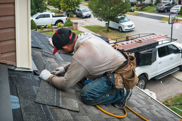 Professional Roofing technician working in Garland, NC